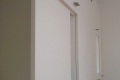 schlafzimmer-schrank-mit-tv-fach-detail-teilgeoffnet-1